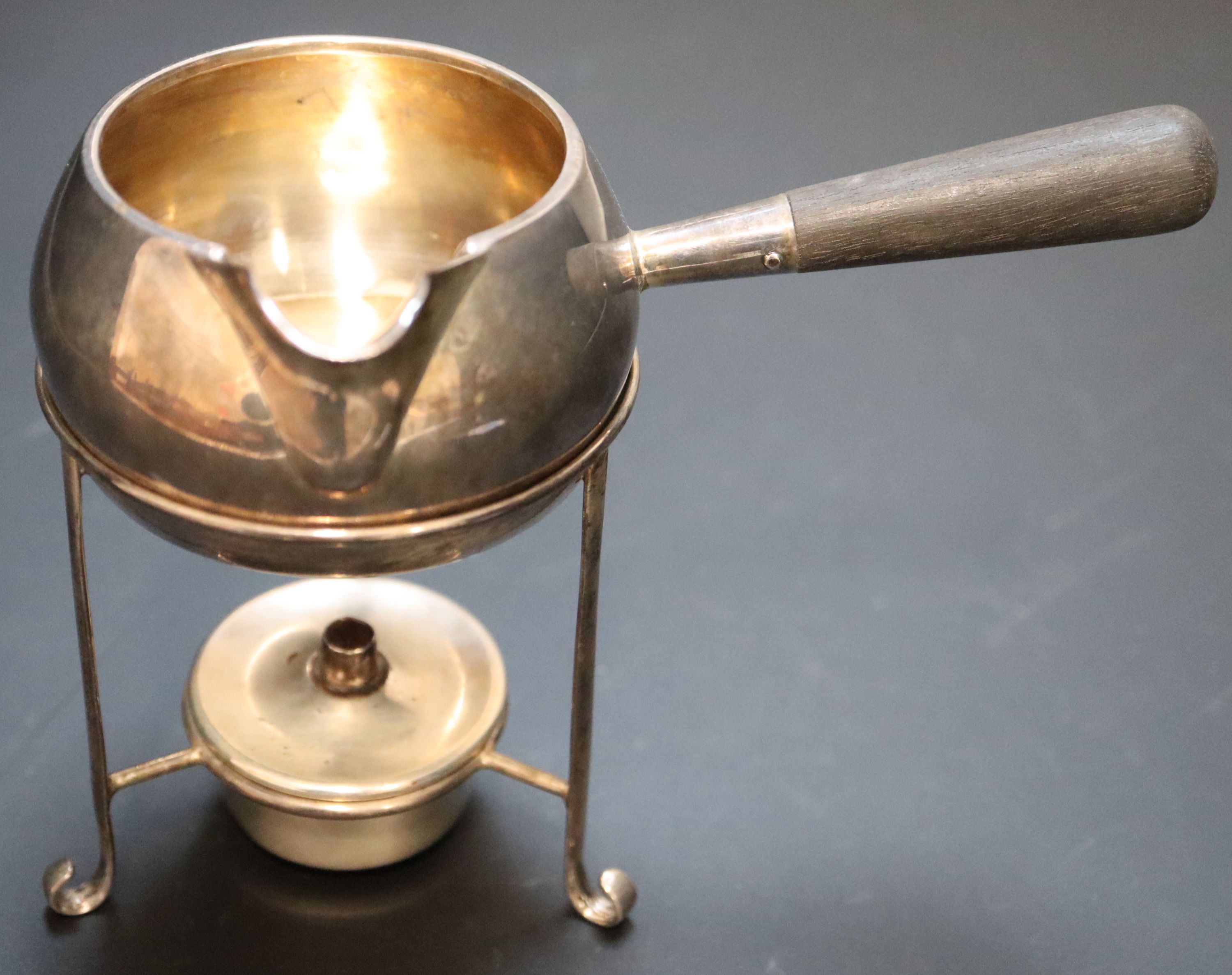 An Edwardian silver brandy warmer and stand with burner, height 11.4cm, gross 5.5oz.